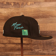 Wearer's right of the Florida Marlins Cooperstown City Transit All Over Side Patch Gray Bottom 59Fifty Fitted Cap