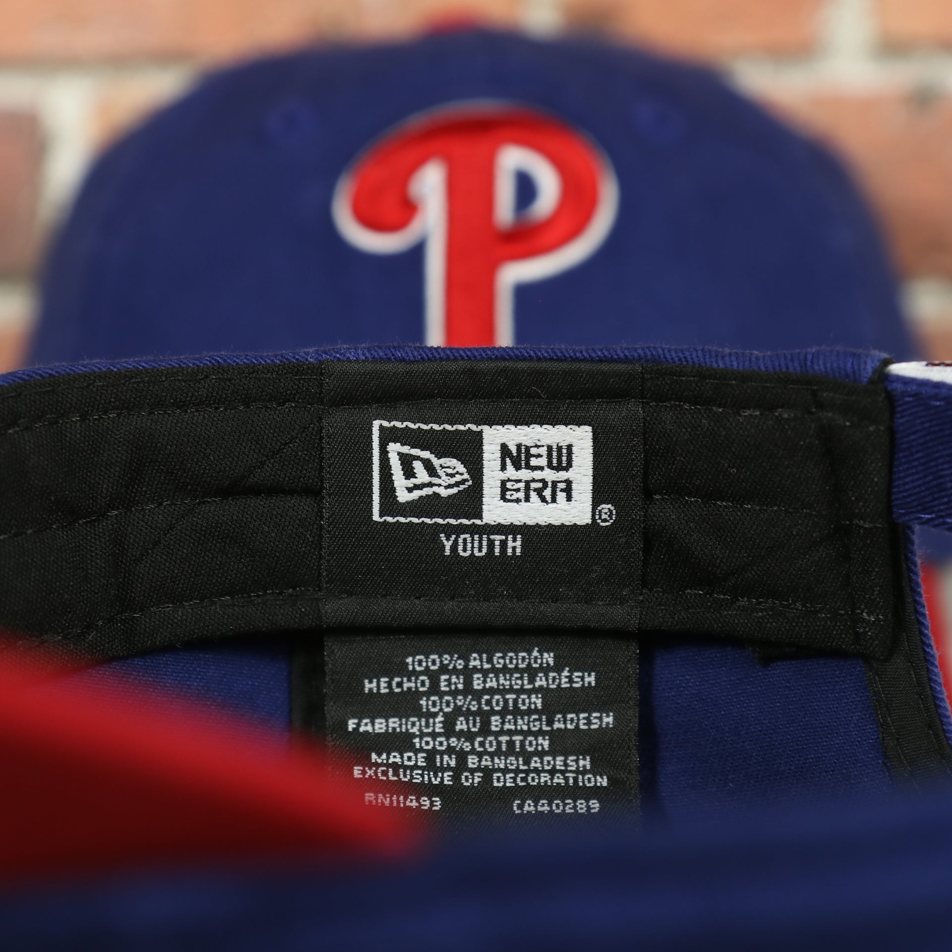 Youth label of the Philadelphia Phillies Core Classic Youth Royal/Red 9Twenty Kid's Dad Hat