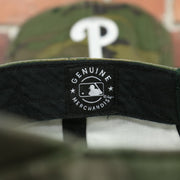 mlb label on the Philadelphia Phillies White Phillies Logo Camo Dad Hat | Camo Hat