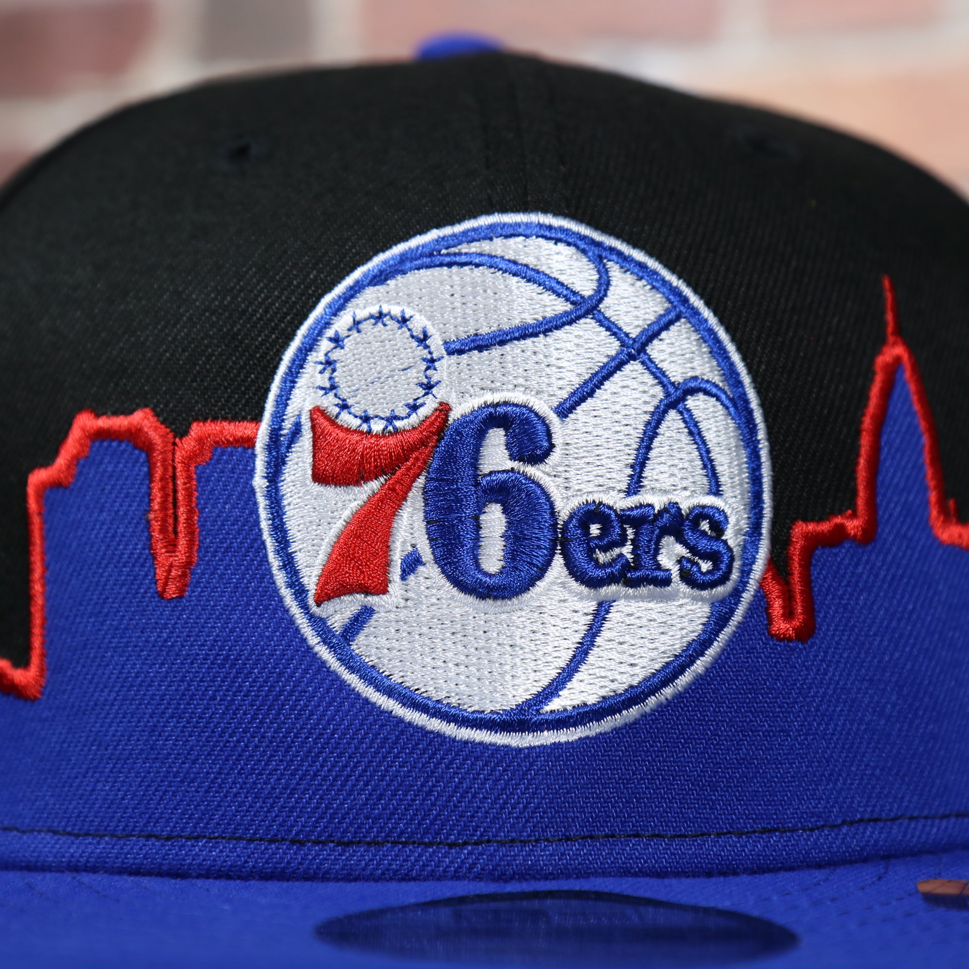 76ers logo on the Philadelphia 76ers City Skyline Side Patch 9Fifty Snapback Hat | Philadelphia Skyline 950