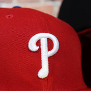 Alternate close up view of the front logo on the Philadelphia Phillies Post Season 2022 MLB Playoffs Side Patch On-Field 59Fifty Fitted Cap