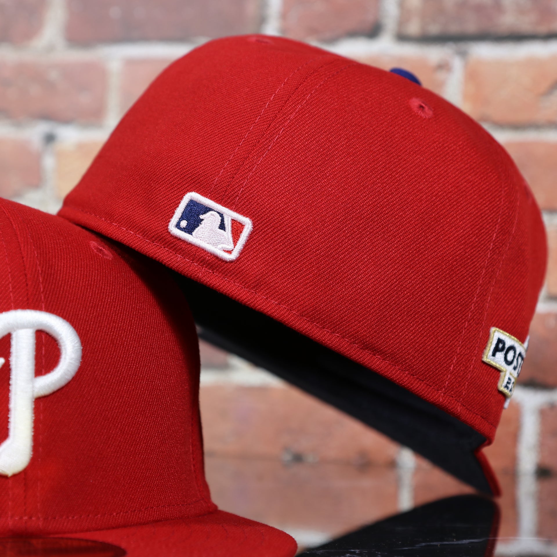 MLB batterman logo on the back of the Philadelphia Phillies Post Season 2022 MLB Playoffs Side Patch On-Field 59Fifty Fitted Cap
