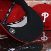 black undervisor on the Philadelphia Phillies Post Season 2022 MLB Playoffs Side Patch On-Field 59Fifty Fitted Cap