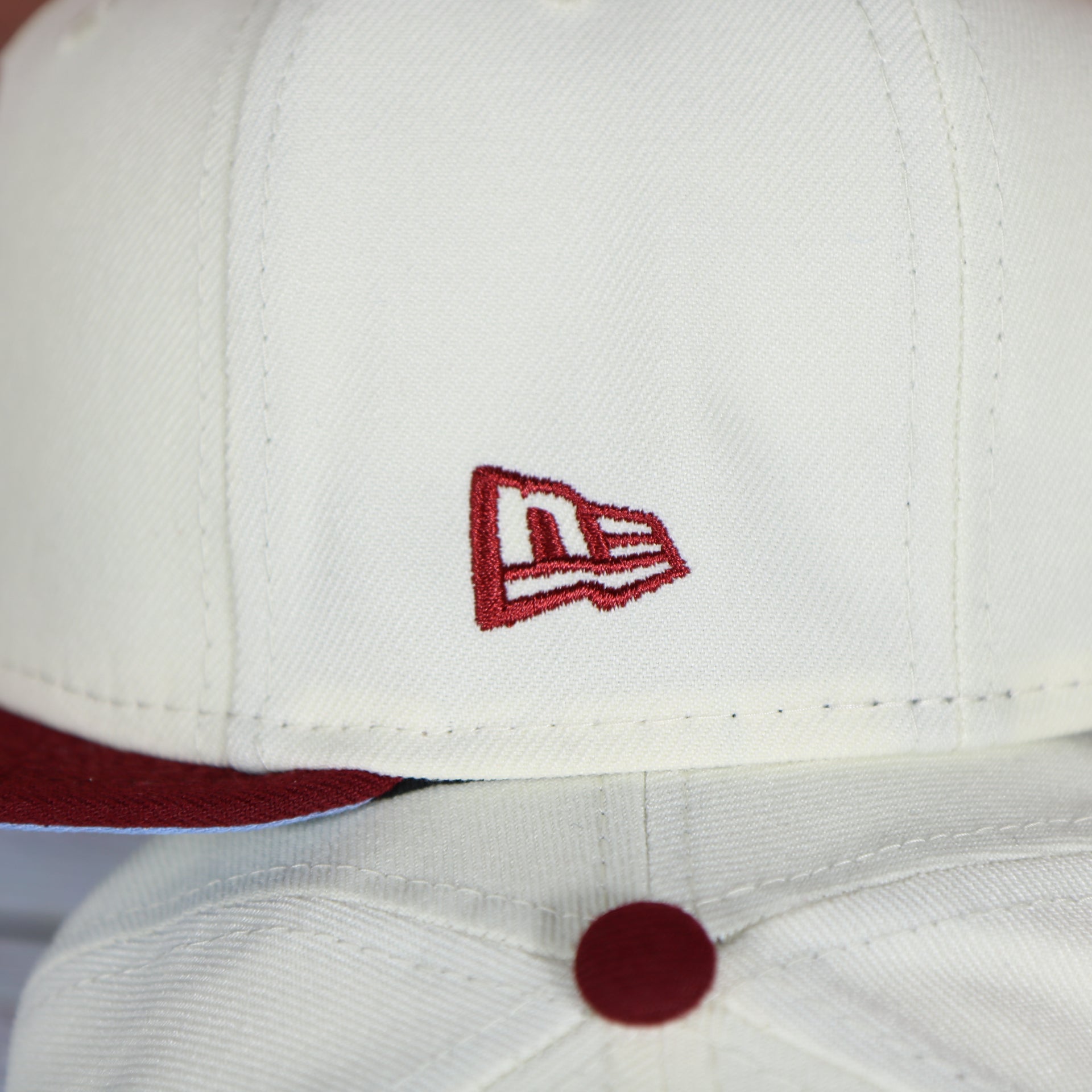 New Era logo on the wearer's left of the Philadelphia Phillies Cooperstown Retro Logo 1980 World Series Champion Side Patch Grey UV 59Fifty Fitted Cap | Chrome/Maroon Cap Swag Exclusive