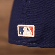 Close up of the MLB Battterman logo on the on the Los Angeles Dodgers 1980 All Star Game Crystal Side Patch Icy Blue Bottom 59Fifty Fitted Cap