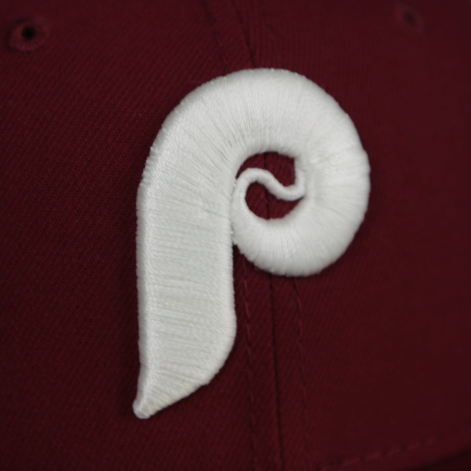 phillies logo on the Philadelphia Phillies 1980 World Series Glow In The Dark Pink Brim 59fifty Cap | Maroon