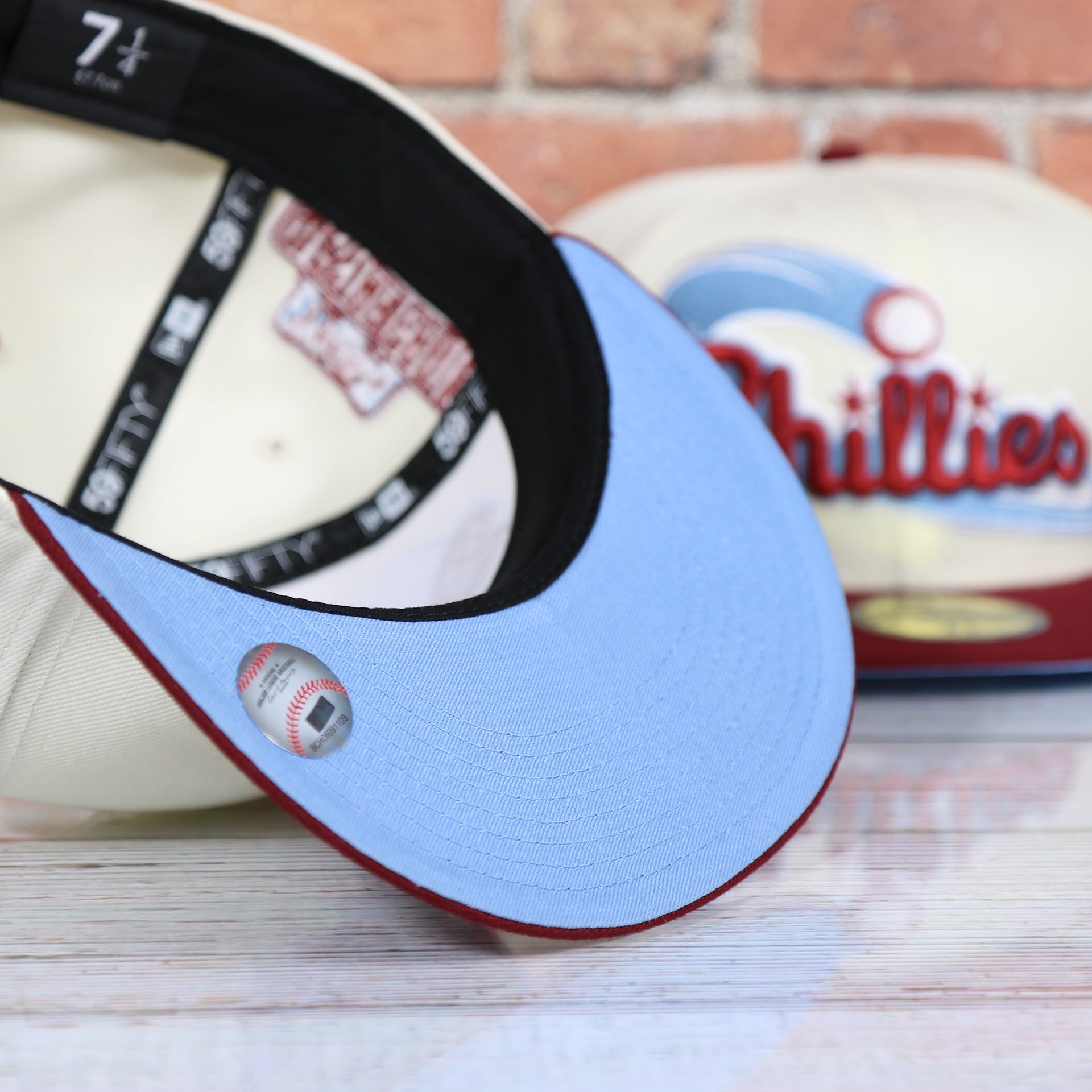 Powder blue under visor on the Philadelphia Phillies Cooperstown Jersey Script Wordmark 1996 All Star Game Side Patch Powder Blue UV 59Fifty Fitted Cap | Chrome/Maroon Cap Swag Exclusive