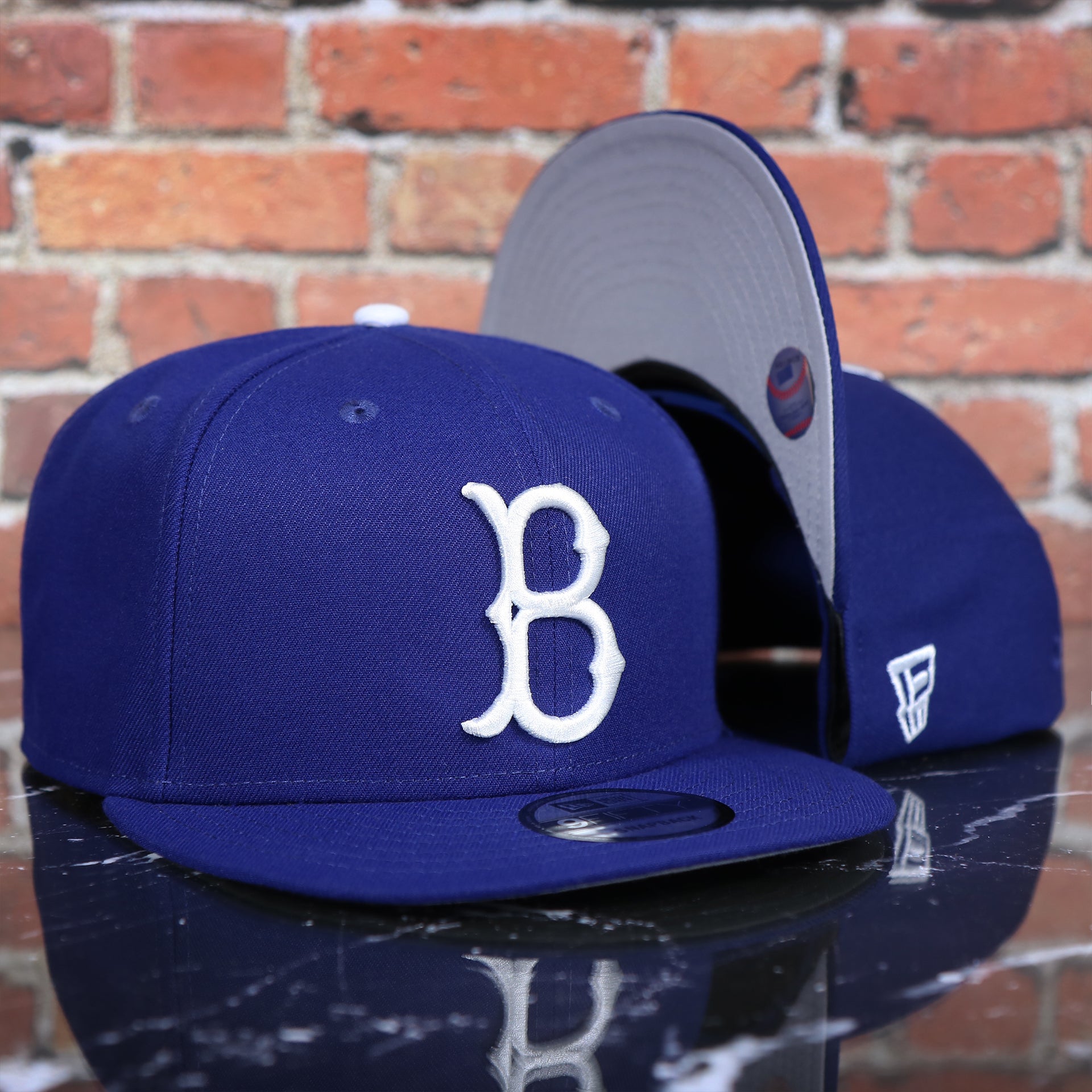 front of the Brooklyn Dodgers Cooperstown Royal Blue 9Fifty Snapback Cap | OSFM
