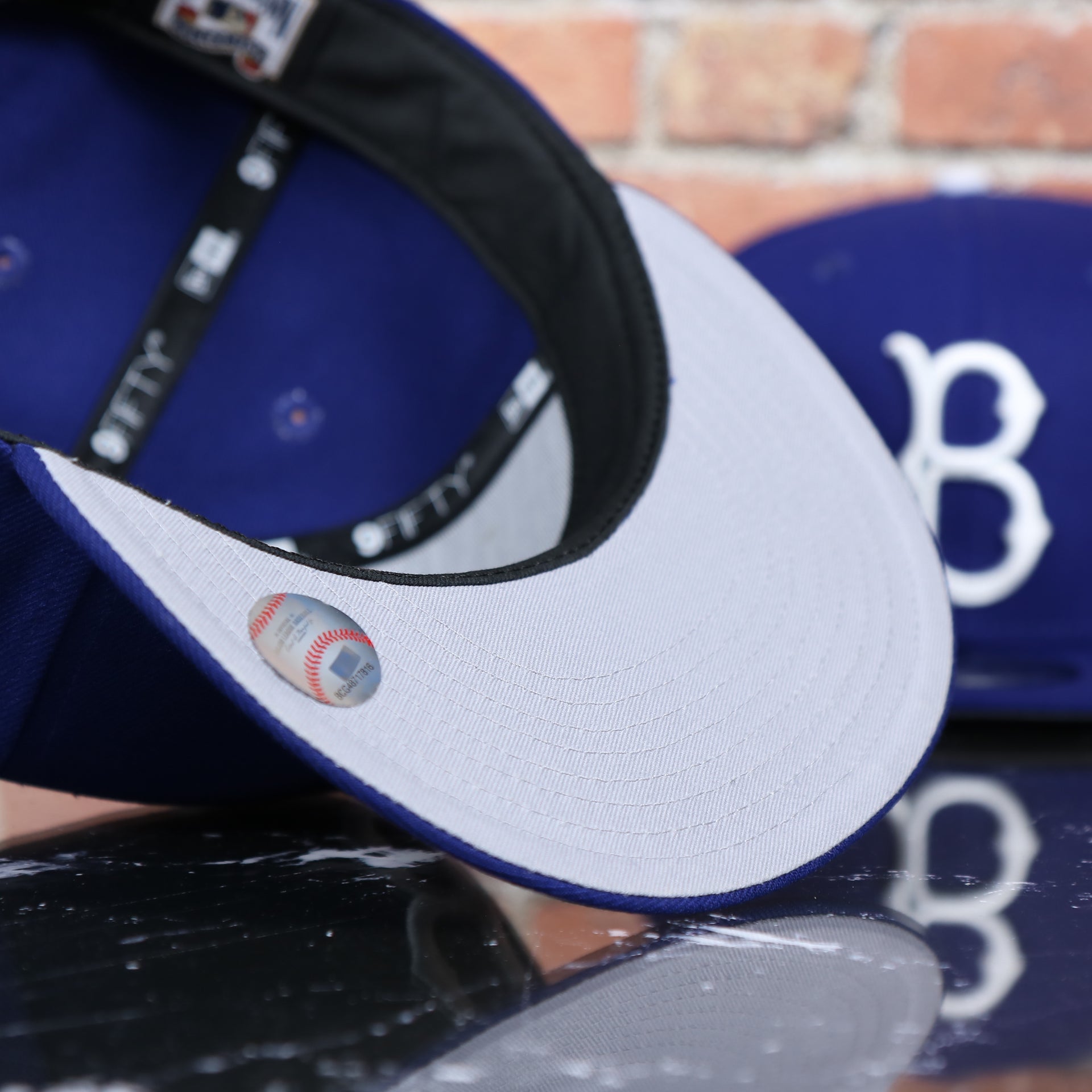 gray bottom on the underside of the Brooklyn Dodgers Cooperstown Royal Blue 9Fifty Snapback Cap | OSFM