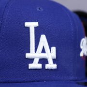 dodgers logo on the Los Angeles Dodgers "Patch Pride" All Over Gray Bottom Side Patch 59Fifty Fitted Cap