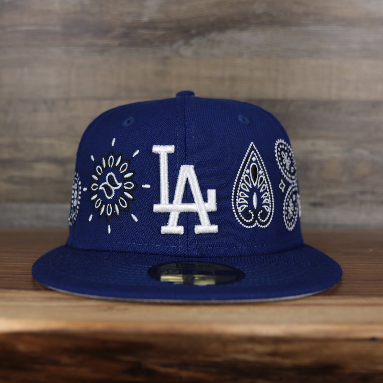 front of the Los Angeles Lakers All Over Paisley Bandana Pattern Grey Bottom 5950 Fitted Cap | Blue