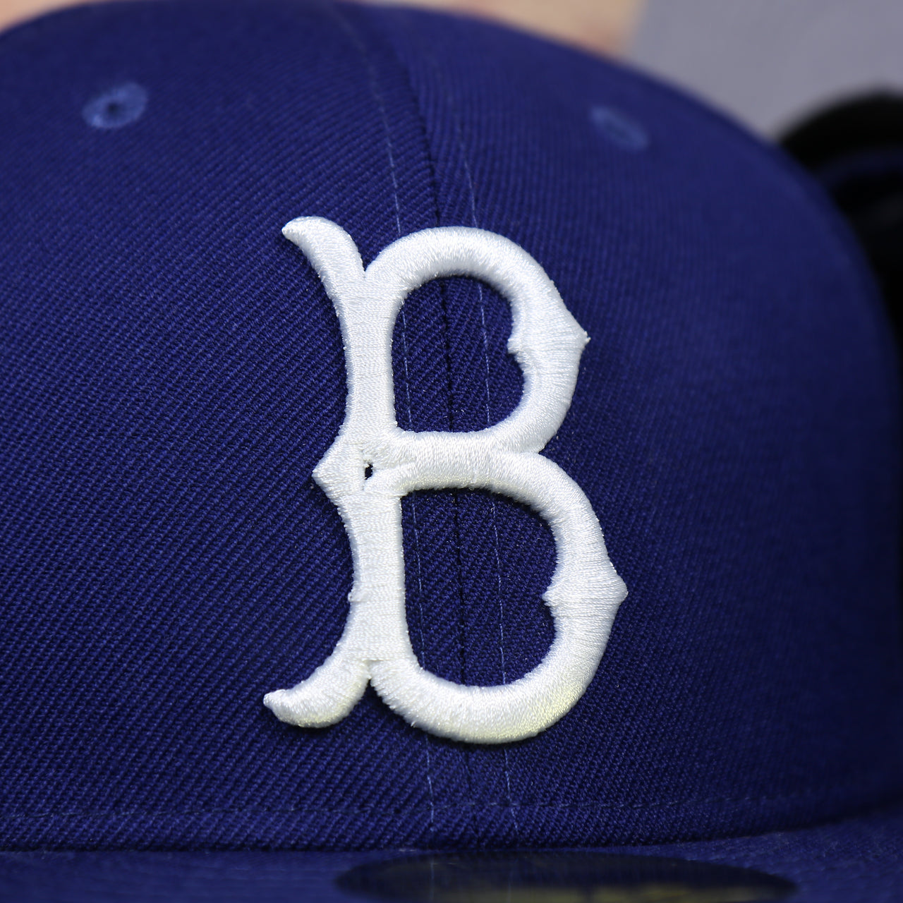 dodgers logo on the Brooklyn Dodgers Royal Blue Grey Bottom Fitted Hat | Royal Blue New Era Grey Brim 59fifty | Dodgers Gray Underbrim Fitted Cap