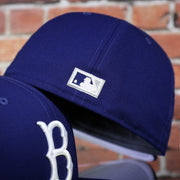 MLB cooperstown logo on the Brooklyn Dodgers Royal Blue Grey Bottom Fitted Hat | Royal Blue New Era Grey Brim 59fifty | Dodgers Gray Underbrim Fitted Cap