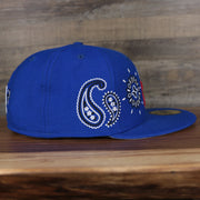 wearers right side of the Philadelphia 76ers All Over Paisley Bandana Pattern Grey Bottom 5950 Fitted Cap | Blue