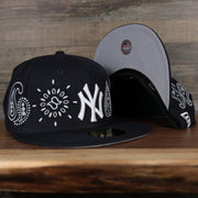 front of the New York Yankees All Over Paisley Bandana Pattern Grey Bottom 5950 Fitted Cap | Navy
