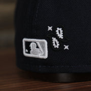 mlb logo on the New York Yankees All Over Paisley Bandana Pattern Grey Bottom 5950 Fitted Cap | Navy