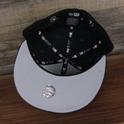 underside of the New York Yankees All Over Paisley Bandana Pattern Grey Bottom 5950 Fitted Cap | Navy