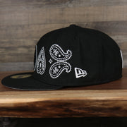 wearers left side of the Brooklyn Nets All Over Paisley Bandana Pattern Grey Bottom 5950 Fitted Cap | Black