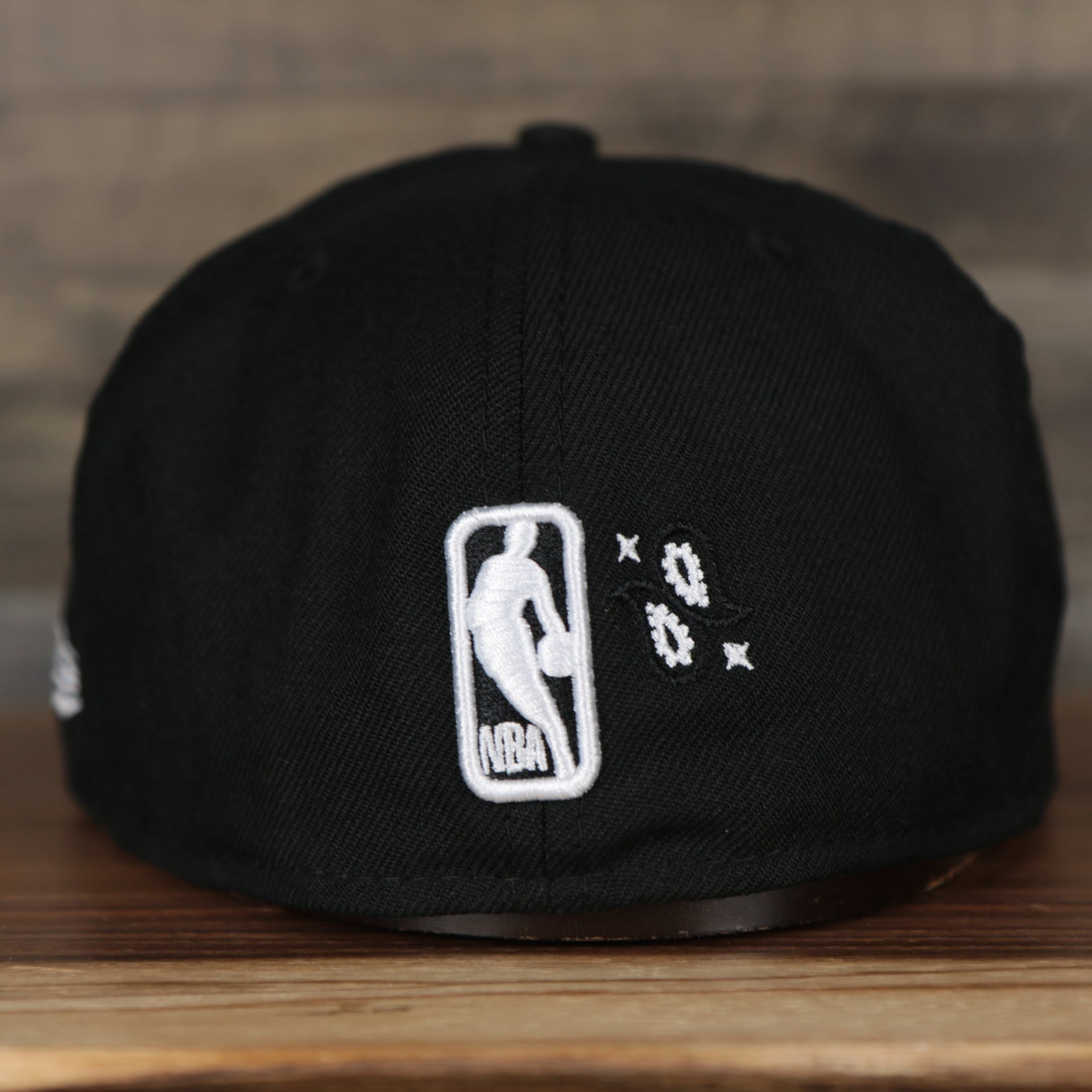 back side of the Brooklyn Nets All Over Paisley Bandana Pattern Grey Bottom 5950 Fitted Cap | Black