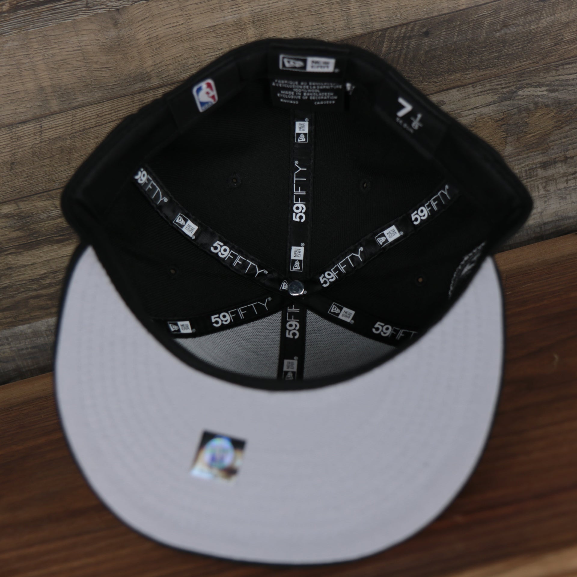 underside of the Brooklyn Nets All Over Paisley Bandana Pattern Grey Bottom 5950 Fitted Cap | Black