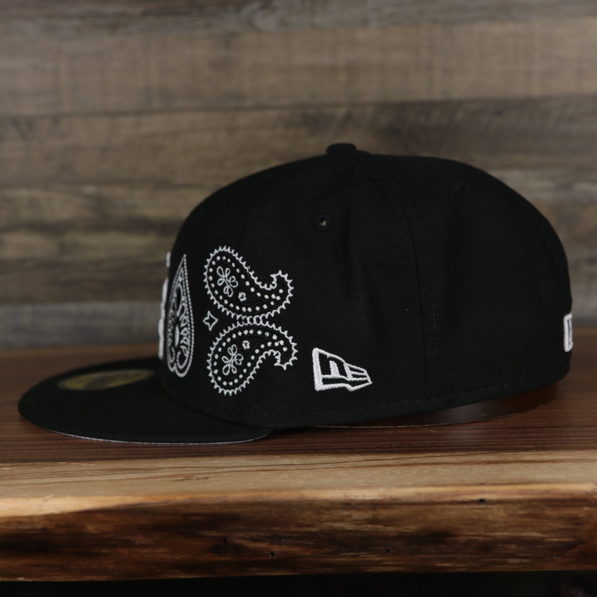 wearers left of the Chicago White Sox All Over Paisley Bandana Pattern Grey Bottom 5950 Fitted Cap | Black