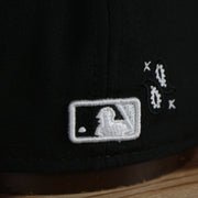 mlb logo on the Chicago White Sox All Over Paisley Bandana Pattern Grey Bottom 5950 Fitted Cap | Black