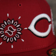 bandana print on the Cincinnati Reds All Over Paisley Bandana Pattern Grey Bottom 5950 Fitted Cap | Red