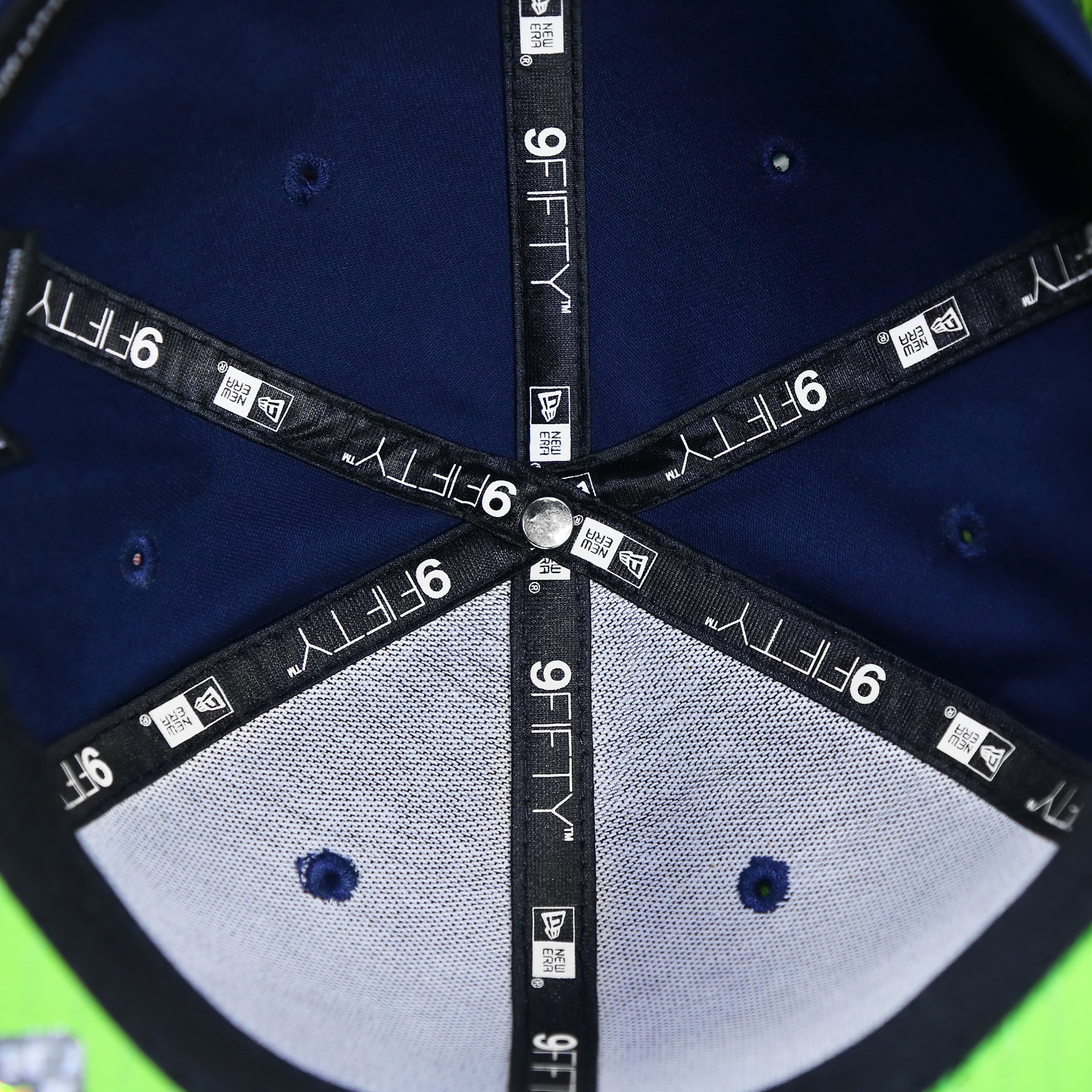 inside taping on the inside of the Seattle Seahawks Crocodile Brim Neon Green Bottom 9Fifty Strapback | Navy/Black