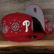 front and bottom of the Philadelphia Phillies All Over Paisley Bandana Pattern Grey Bottom Red 5950 Fitted Cap | Bandana Paisley