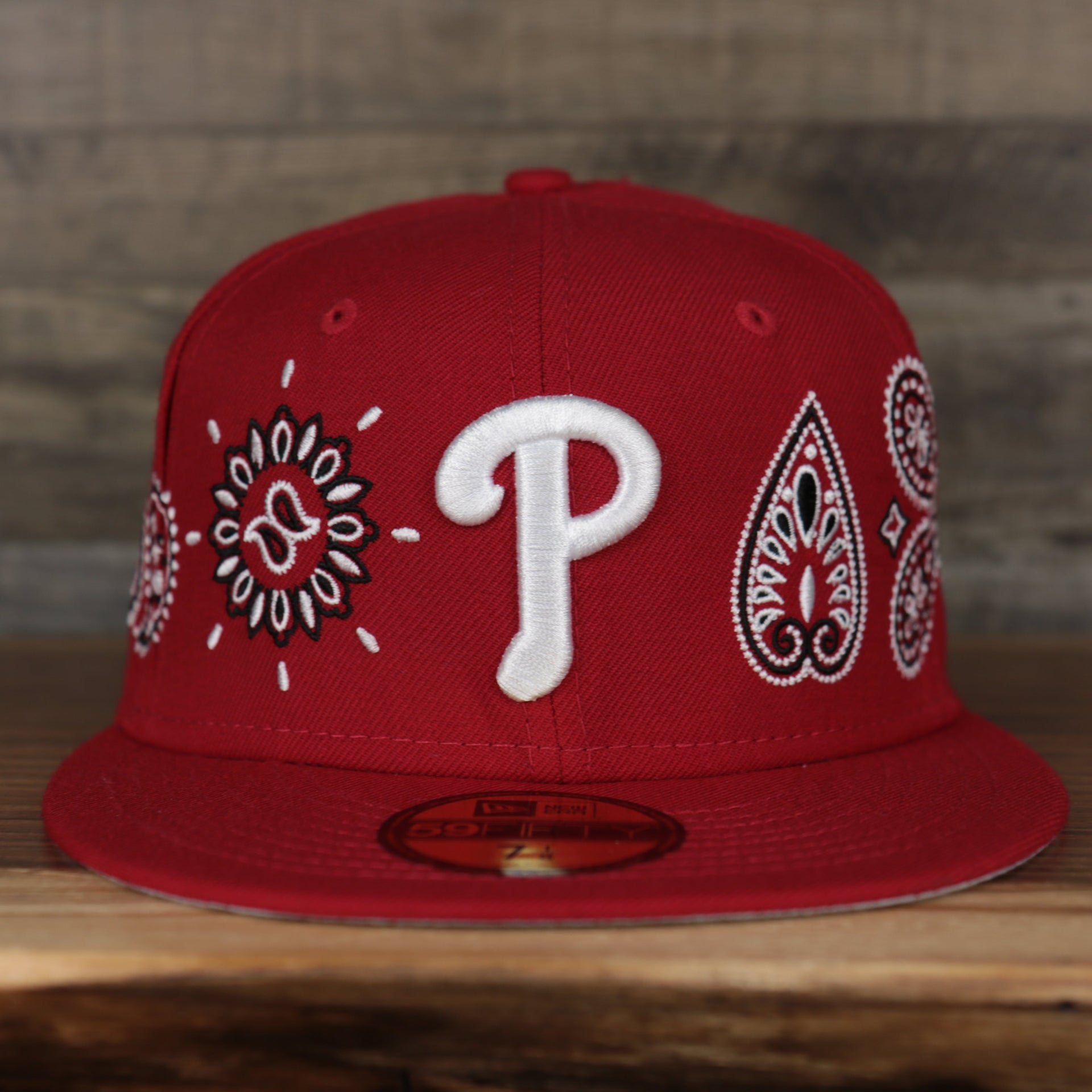 front of the Philadelphia Phillies All Over Paisley Bandana Pattern Grey Bottom Red 5950 Fitted Cap | Bandana Paisley