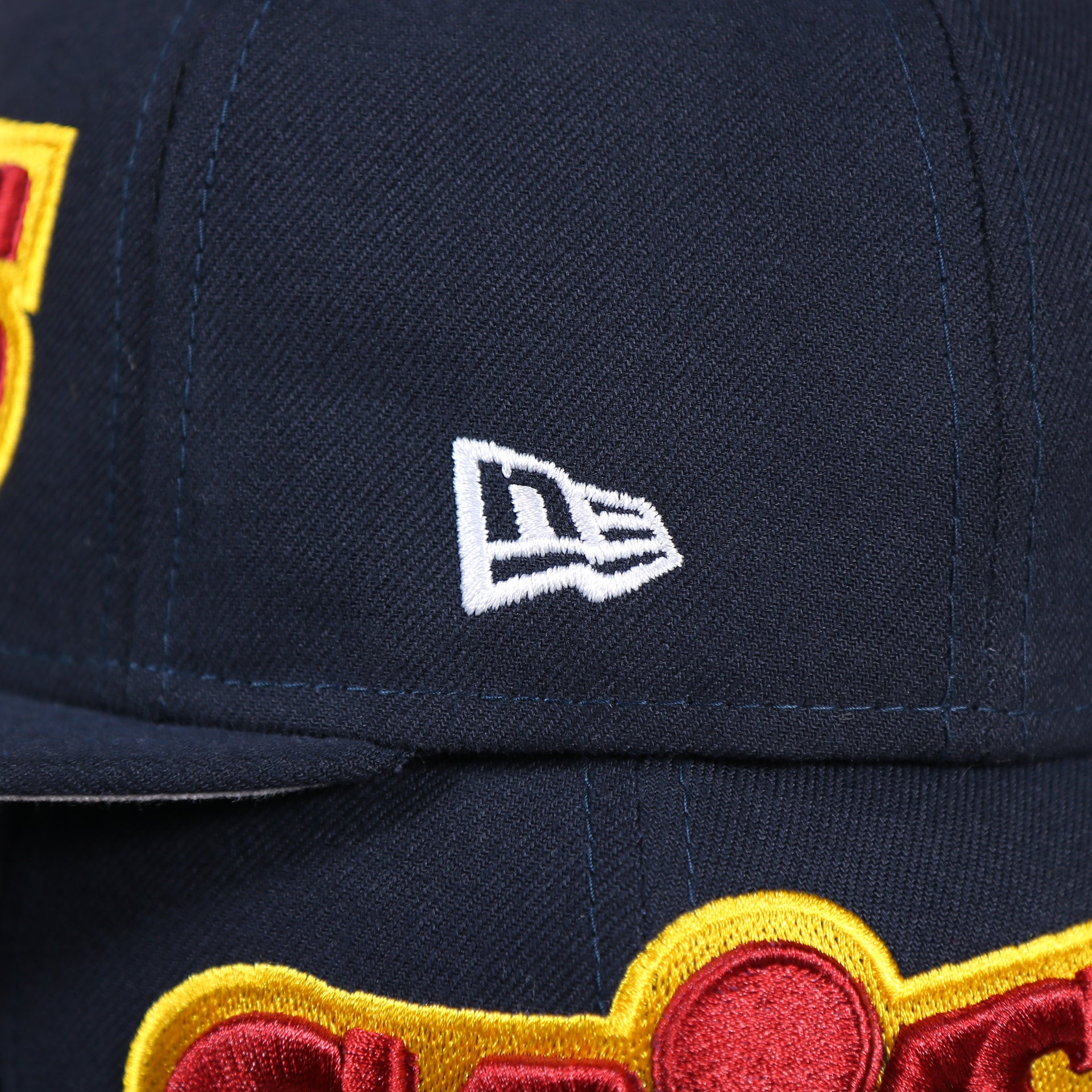 new era flag on the wearers left side of the Cleveland Cavaliers Vintage City Flag Side Patch Gray Bottom 9Fifty Snapback | Navy