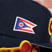 Cleveland Flag Side Patch on the wearers right side of the Cleveland Cavaliers Vintage City Flag Side Patch Gray Bottom 9Fifty Snapback | Navy