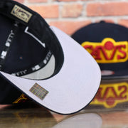 grey underbrim on the bottom of the Cleveland Cavaliers Vintage City Flag Side Patch Gray Bottom 9Fifty Snapback | Navy