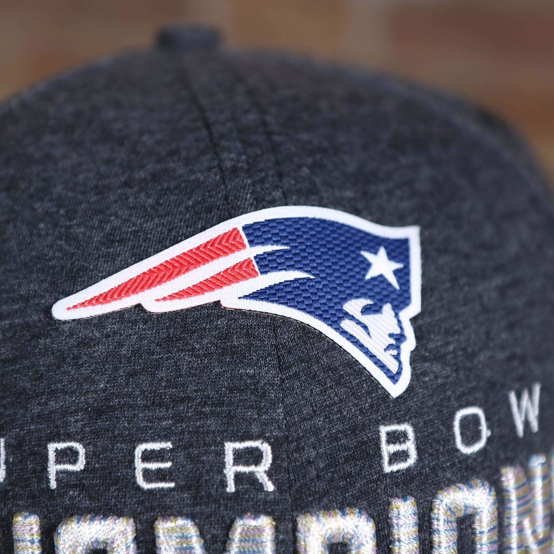 patriots logo on the New England Patriots Locker Room Super Bowl LI Championship Trophy 9Forty Dad Hat