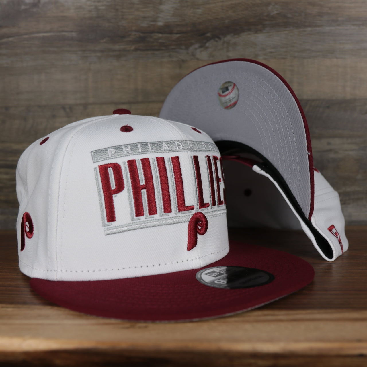 front aqnd bottom of the Philadelphia Phillies Retro 9Fifty Grey Bottom Snapback | White