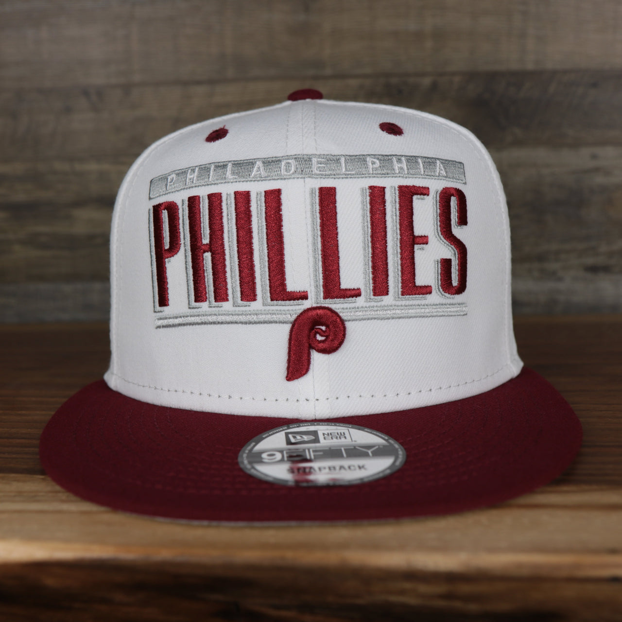 front of the Philadelphia Phillies Retro 9Fifty Grey Bottom Snapback | White
