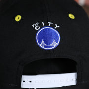 the city logo on the back side of the Golden State Warriors Gray Bottom 9Fifty Snapback Cap | Black