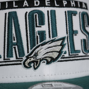 front logo on the Philadelphia Eagles Retro 9Fifty Grey Bottom Snapback | White