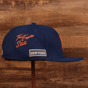 Wearer's right side of the New York Mets City Transit All Over Side Patch Gray Bottom 59Fifty Fitted Cap