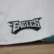 eagles logo on the Philadelphia Eagles Retro 9Fifty Grey Bottom Snapback | White