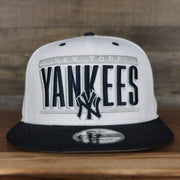 front of the New York Yankees Retro 9Fifty Grey Bottom Snapback | White