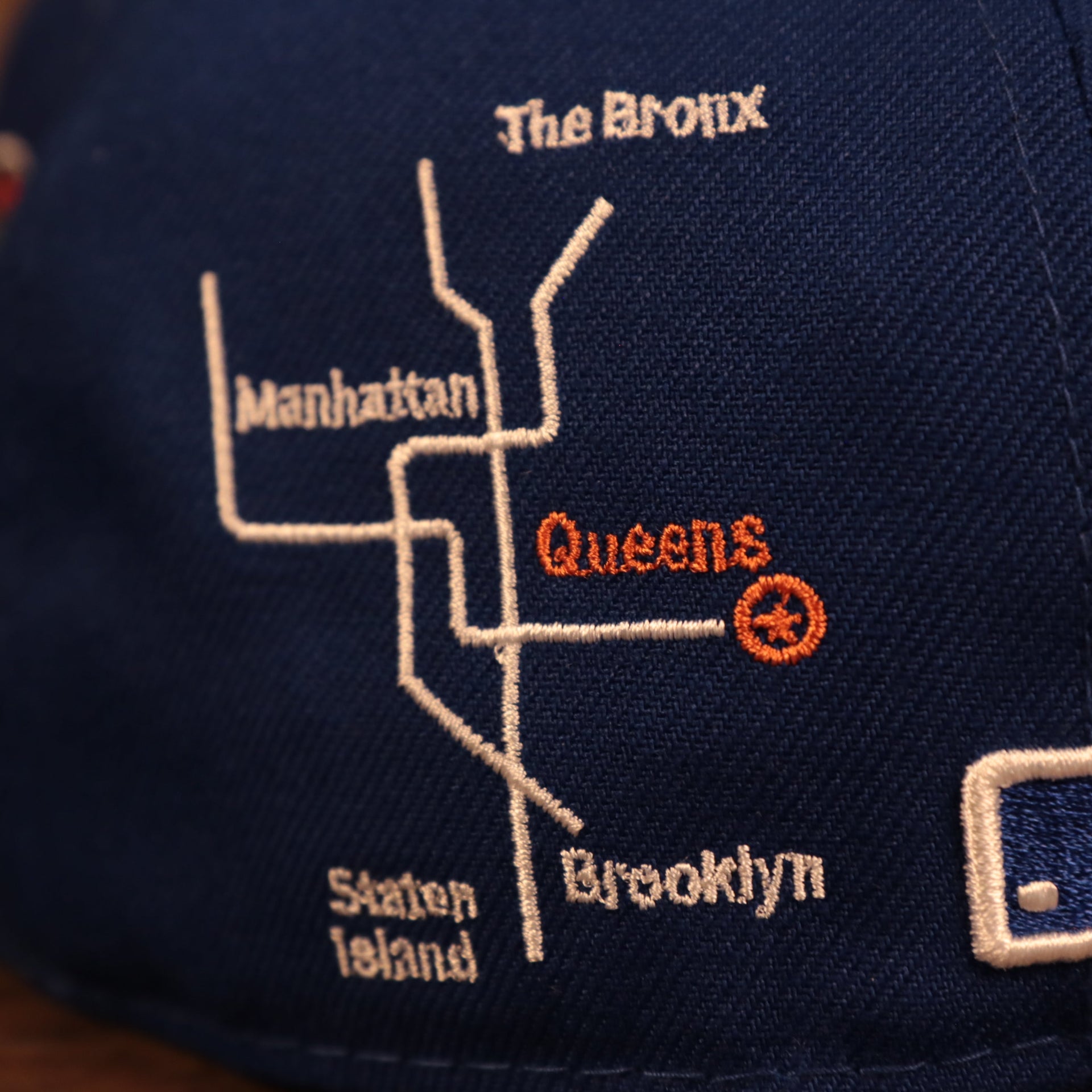 Close up of the city transit map of the New York Mets City Transit All Over Side Patch Gray Bottom 59Fifty Fitted Cap