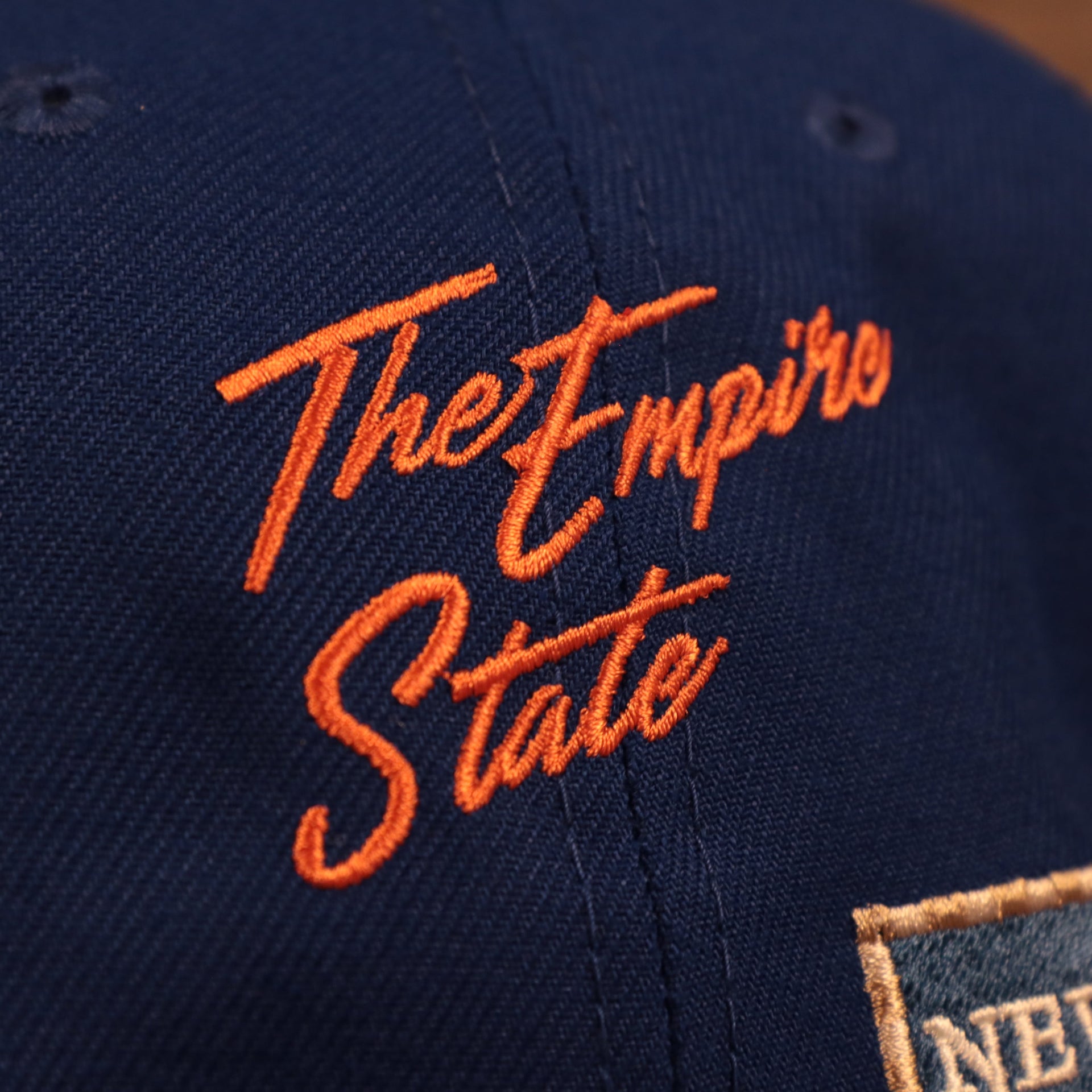 Close up of the Empire State script of the New York Mets City Transit All Over Side Patch Gray Bottom 59Fifty Fitted Cap