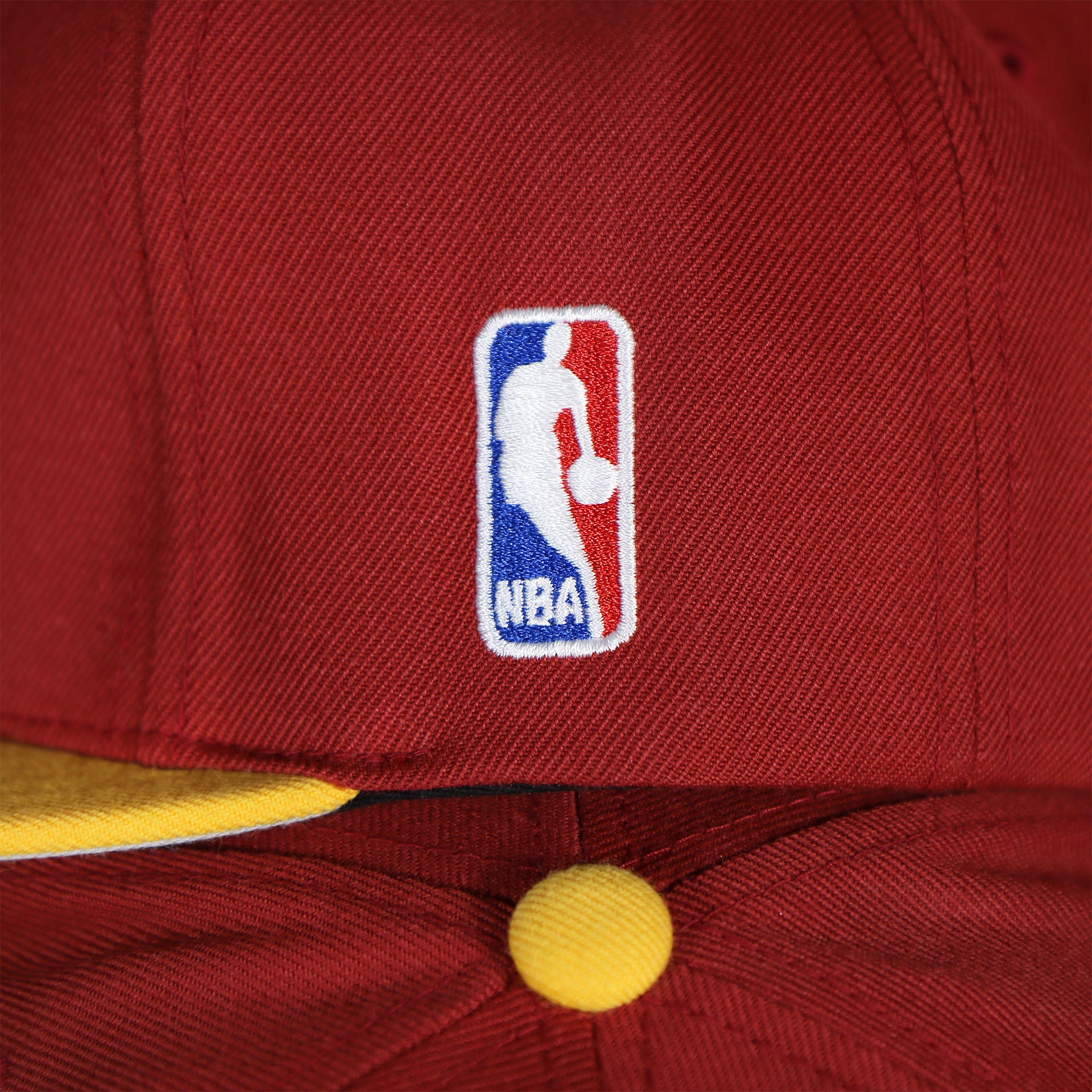 nba logo on the wearers right side of the Cleveland Cavaliers Vintage Hardwood Classic Gray Bottom 9Fifty Snapback | Red/Yellow