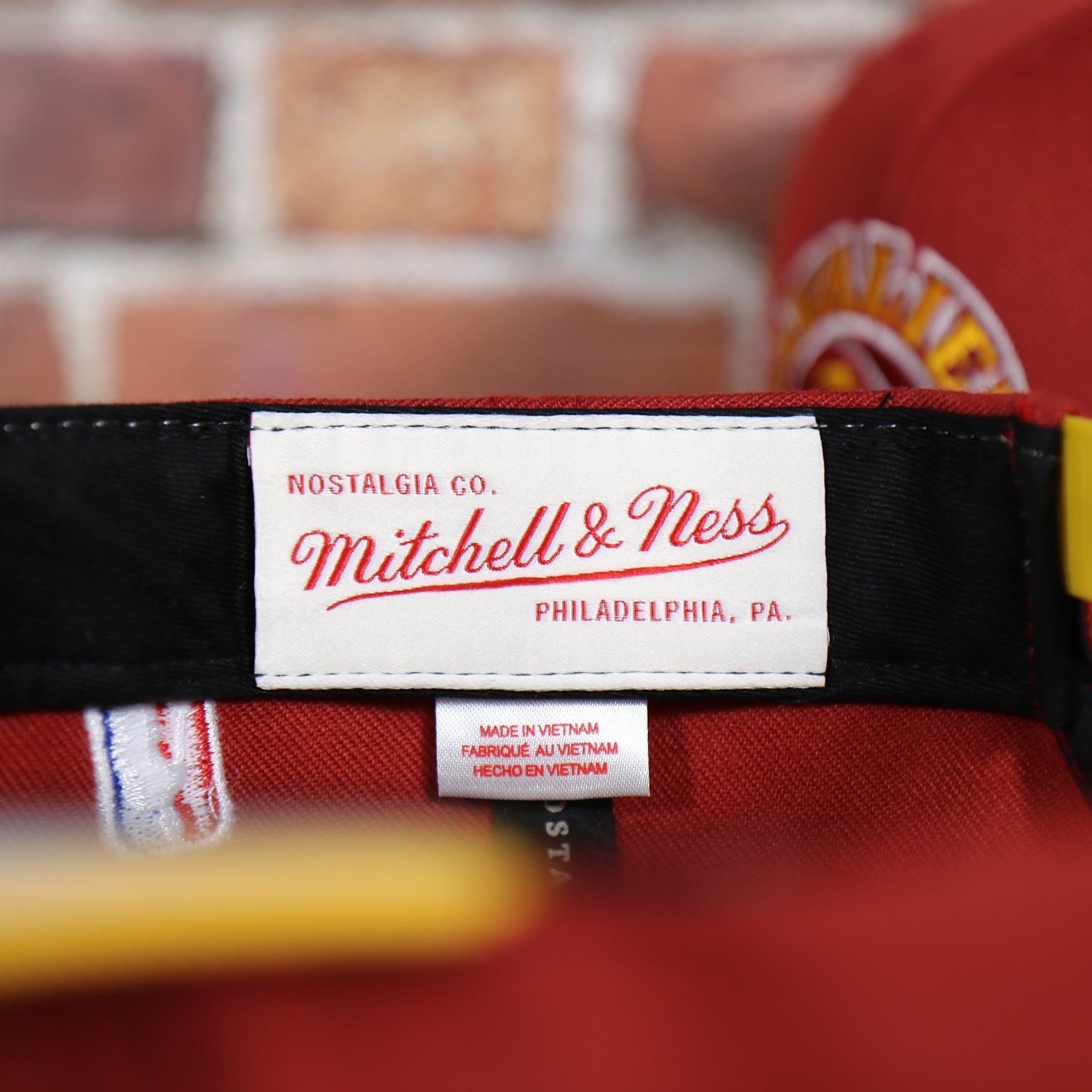 mitchell and ness tag on the inside of the Cleveland Cavaliers Vintage Hardwood Classic Gray Bottom 9Fifty Snapback | Red/Yellow