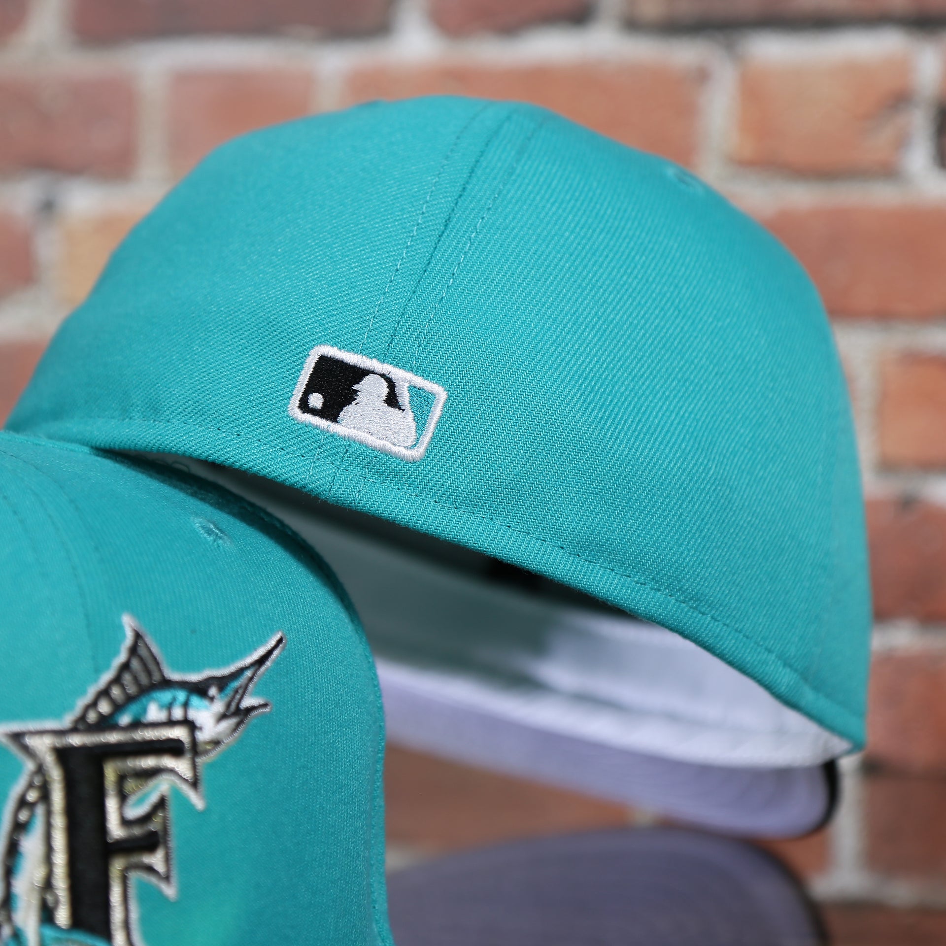 back side of the Florida Marlins Cooperstown 1997 World Series Side Patch Grey Bottom 59Fifty Fitted Cap | Teal