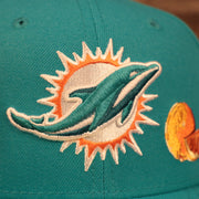 Close up of the Miami Dolphins logo on the Miami Dolphins City Transit All Over Side Patch Gray Bottom 59Fifty Fitted Cap