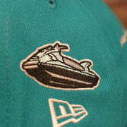 Close up of the jet ski side patch on the Miami Dolphins City Transit All Over Side Patch Gray Bottom 59Fifty Fitted Cap