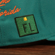 FL side patch on the Miami Dolphins City Transit All Over Side Patch Gray Bottom 59Fifty Fitted Cap