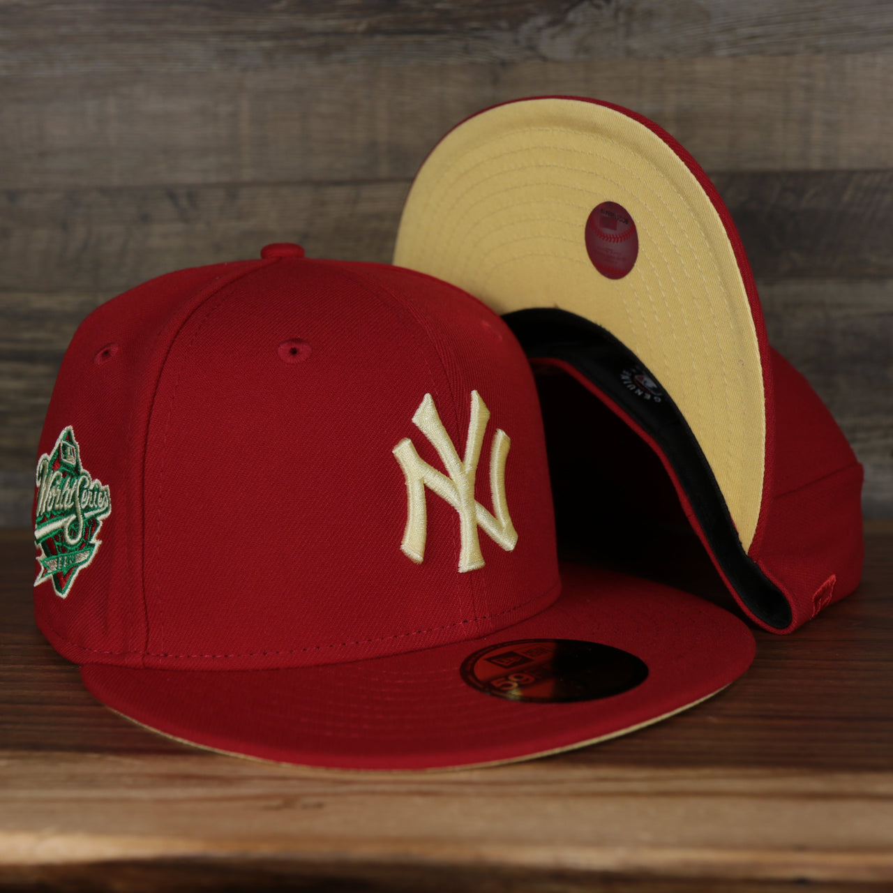 front and bottom of the New York Yankees 1999 World Series Side Patch Yellow Bottom 59Fifty Fitted Cap | Red | State Fruit